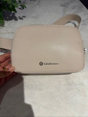 lululemon Cream Crossbody Bag with Silver Logo